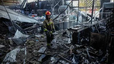 A firefighter inspects the site of a supermarket hit by a Russian drone strike, amid Russia's attack on Ukraine, in Chernihiv, Ukraine July 26, 2026. REUTERS/Maksym Kishka