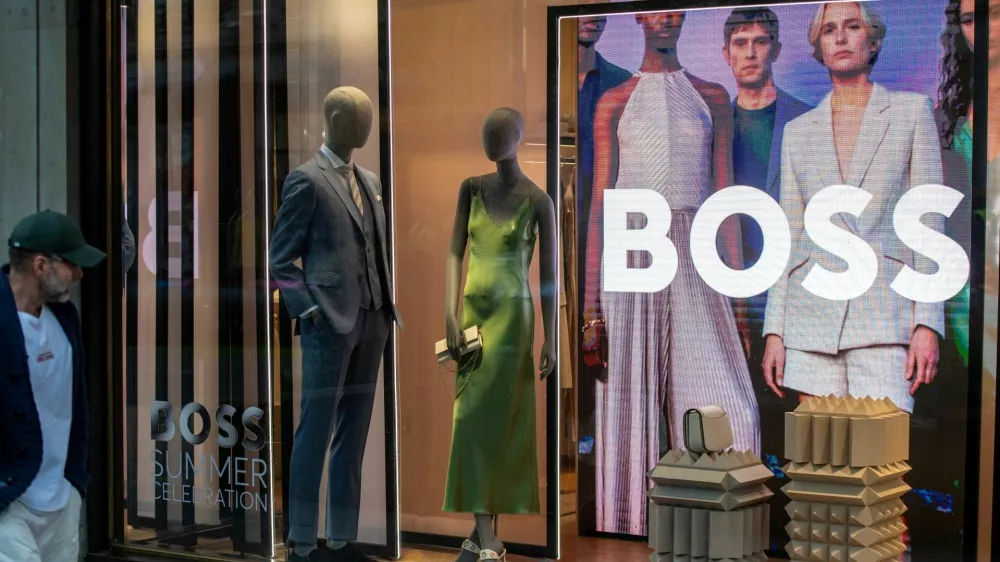FILE PHOTO: A window display is seen at the Boss store in London, Britain, May 30,2024. REUTERS/Chris J. Ratcliffe/File Photo