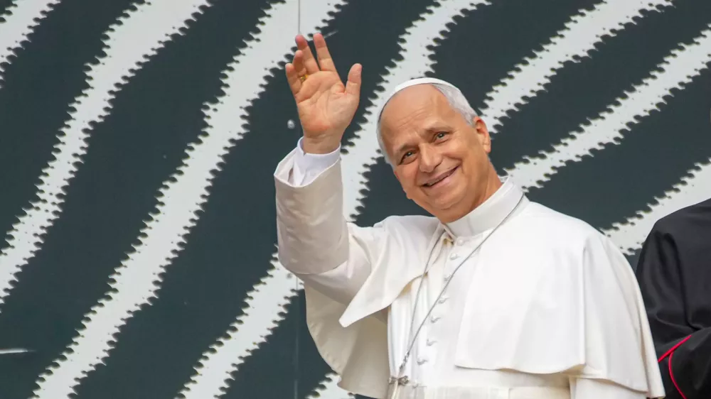 Pope Leo XIV waves as he arrives at the Vatican Library on the day of his 71st birthday, Monday, Sept. 14, 2026, during a press preview of the exhibit ""AQVA, Catastrophe and Wonder," which will be open to the public from Sept. 25 through May 14, 2027. (AP Photo/Andrew Medichini)