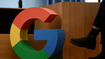 FILE PHOTO: A Google sign is pictured during the company's presentation of a detailed investment plan for Germany outside the Google office in Berlin, Germany, August 31, 2021. REUTERS/Annegret Hilse/File Photo