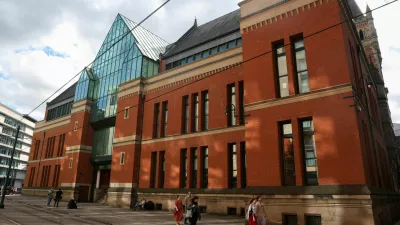 People walk past the Minshull Street Crown Court, as 13 men go on trial charged with serious sexual &zwnj;offences against the same woman, who is the wife of one of the accused, in Manchester, Britain, September 14, 2026. REUTERS/Temilade Adelaja