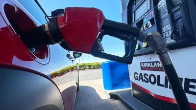 FILE - A motorist fills up the tank of a vehicle at a Costco gasoline station Wednesday, April 15, 2026, in Sheridan, Colo. (AP Photo/David Zalubowski, file)