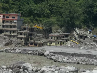 NUWAKOT, NEPAL - SEPTEMBER 14: Aftermath of devastating flash floods that struck Nepal on August 26 is seen in Nuwakot, where people in the affected areas continue to return to the ruins of their homes, searching for belongings and the last remnants of lives that were swept away, in Bagmati province, central Nepal, on September 14, 2026. Some survivors salvage whatever they can from the debris, while others stand silently at the places where their homes once stood. Religious figures visit the affected areas to hold prayers for those who died in the disaster, with some prayers continuing for a day or two, while bereaved families gather to remember their loved ones and pray for the peace of their souls. Meanwhile, families searching for missing relatives continue to visit hospitals in Kathmandu, where they look through photographs and lists of missing people displayed on hospital walls. Some use mobile phone video calls to show the photographs to family members and seek help identifying their missing loved ones, in Nuwakot, northwest of Kathmandu. Abdul Goni / AnadoluNo Use USA No use UK No use Canada No use France No use Japan No use Italy No use Australia No use Spain No use Belgium No use Korea No use South Africa No use Hong Kong No use New Zealand No use Turkey