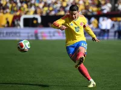 FILE - Colombia midfielder James Rodr&iacute;guez (10) plays the ball during the second half of an international friendly soccer match against France, Sunday, March 29, 2026, in Landover, Md. (AP Photo/Nick Wass, File)
