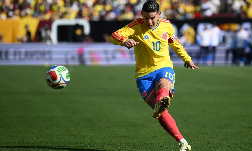 FILE - Colombia midfielder James Rodr&iacute;guez (10) plays the ball during the second half of an international friendly soccer match against France, Sunday, March 29, 2026, in Landover, Md. (AP Photo/Nick Wass, File)