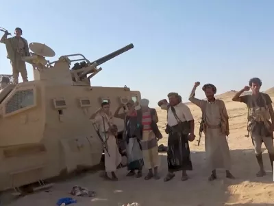 Iran-aligned Houthi fighters pose next to a captured vehicle following what the source described as an attack on Saudi-backed forces in the location given by the source as al Jawf governorate, Yemen, in this screengrab taken from a video released by Houthi Military Media on September 15, 2026. HOUTHI MILITARY MEDIA/Handout via REUTERS. THIS IMAGE HAS BEEN SUPPLIED BY A THIRD PARTY. Verification Lines: Reuters could not verify the location or exact date when the video was filmed. However, no older versions of the video were found posted online before September 15.
