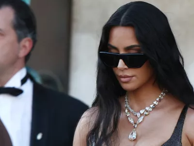 FILE PHOTO: Kim Kardashian leaves Gritti Palace, on the second day of the wedding festivities of Amazon founder Jeff Bezos and journalist Lauren Sanchez, in Venice, Italy, June 27, 2025. REUTERS/Guglielmo Mangiapane/File Photo