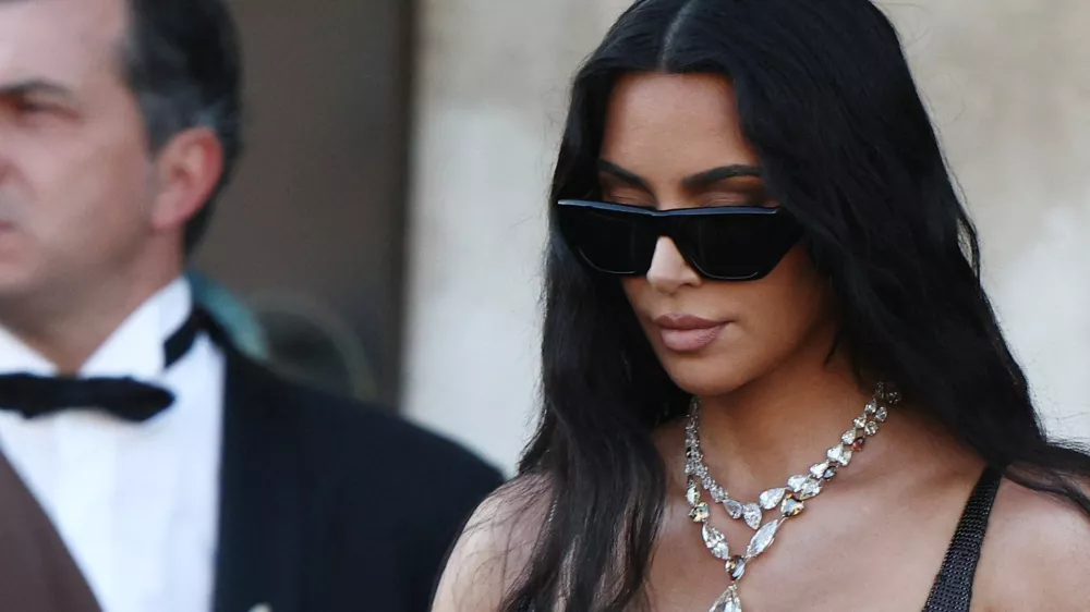 FILE PHOTO: Kim Kardashian leaves Gritti Palace, on the second day of the wedding festivities of Amazon founder Jeff Bezos and journalist Lauren Sanchez, in Venice, Italy, June 27, 2025. REUTERS/Guglielmo Mangiapane/File Photo