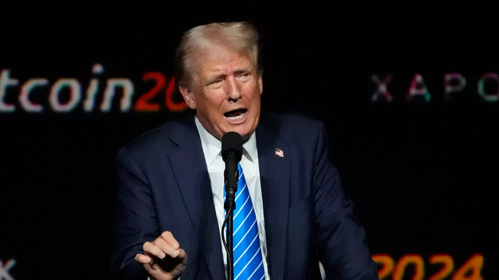 FILE - Republican presidential candidate former President Donald Trump speaks at the Bitcoin Conference, July 27, 2024, in Nashville, Tenn. (AP Photo/Mark Humphrey, File)