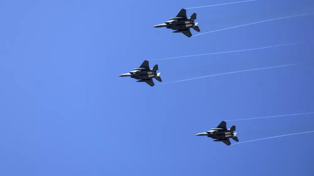 South Korean Air Force F-15K fighter jets fly during the joint military drill between South Korea and the United States at Seungjin Fire Training Field in Pocheon, South Korea, Thursday, March 6, 2025. (Yonhap via AP)