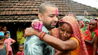 Nepali hydropower worker Sanjay Sah (L) breaks down after meeting his mother at his residence in Nepal's Saptari district on September 13, 2026 after being rescued from a flooded tunnel in the aftermath of deadly flash floods. For 10 days, Nepali hydropower worker Sanjay Sah survived in darkness inside a flooded tunnel, drinking muddy water and losing all sense of time as he desperately prayed for rescue.,Image: 1134122125, License: Rights-managed, Restrictions: "The erroneous mention[s] appearing in the metadata of this photo by Deepesh Deo Joshi has been modified in AFP systems in the following manner: [September 13] instead of [September 12]. Please immediately remove the erroneous mention[s] from all your onli, Model Release: no 