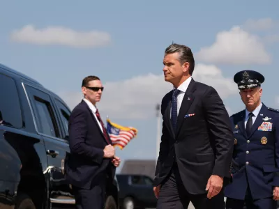 Defense Secretary Pete Hegseth, left, and Chairman of the Joint Chiefs of Staff Gen. Dan Caine, right, arrive Wednesday, July 22, 2026, at Dover Air Force Base, Del. (AP Photo/Julia Demaree Nikhinson)