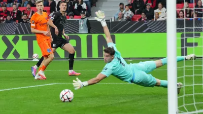Leverkusen's Patrik Schick, center, fails to score during the Europa League opening phase soccer match between Bayer Leverkusen and NK Celje in Leverkusen, Germany, Wednesday, Sept. 16, 2026. (AP Photo/Martin Meissner)