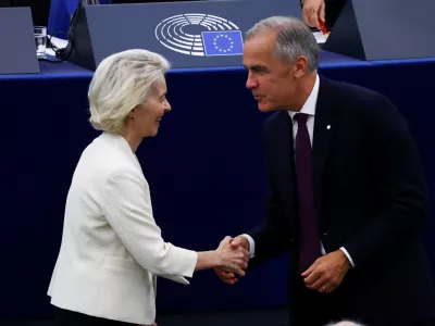 Canadian Prime Minister Mark Carney shakes hands with European Commission President Ursula von der Leyen as he attends her State of the European Union address (SOTEU) to the European Parliament, in Strasbourg, France, September 16, 2026. REUTERS/Yves Herman