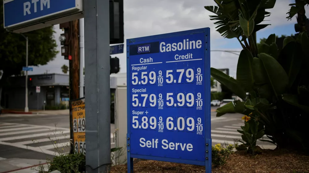 Gas prices are listed at a service station in Los Angeles, California, U.S., September 16, 2026. REUTERS/Daniel Cole