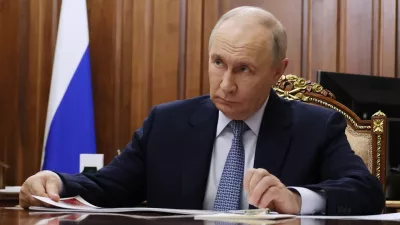 Russian President Vladimir Putin listens to the Head of the Russian Federal Service for the Oversight of Consumer Protection and Welfare (Rospotrebnadzor) Anna Popova at the Kremlin in Moscow, Tuesday, Sept. 15, 2026. (Vyacheslav Prokofyev/Sputnik, Kremlin Pool Photo via AP)