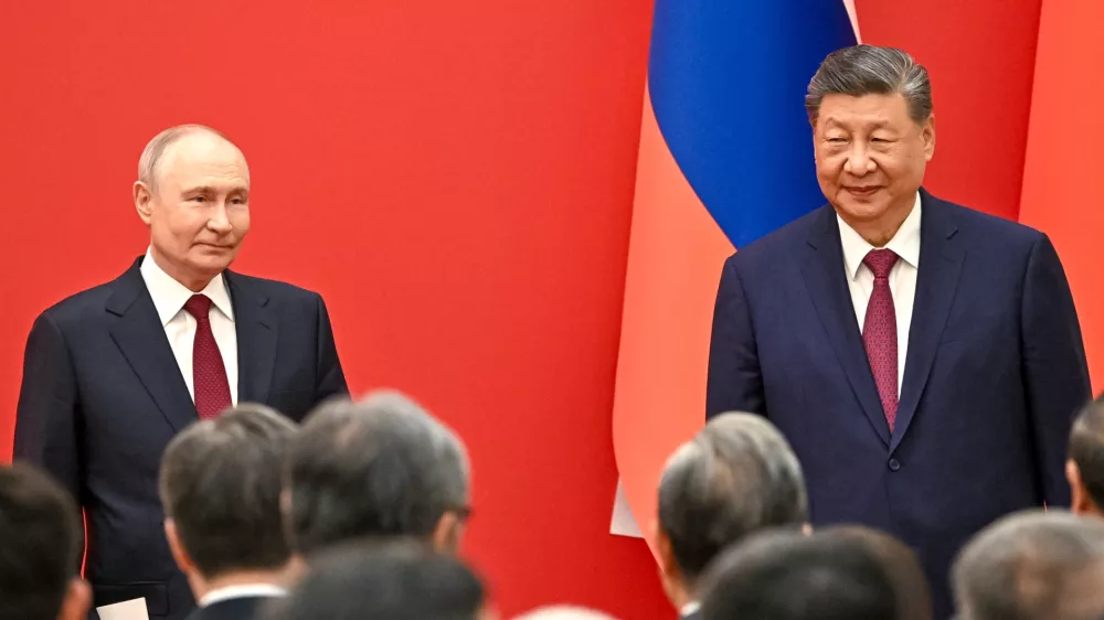 Russian President Vladimir Putin, left, and Chinese President Xi Jinping attend an opening ceremony of the China-Russia Years of Education at the Great Hall of the People in Beijing, Wednesday, May 20, 2026. (Kristina Solovyova, Sputnik, Kremlin Pool Photo via AP)