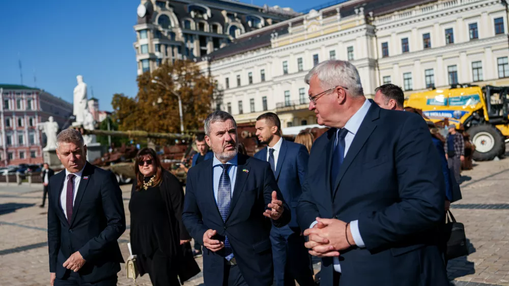 From left: Slovenian Minister of Defence Valentin Hajdinjak, Slovenian Foreign Minister Tone Kajzer and Ukrainian Foreign Minister Andrii Sybiha walk at Saint Michael's Square in Kyiv, Ukraine, on Thursday, September 17, 2026. (AP Photo/Evgeniy Maloletka)
