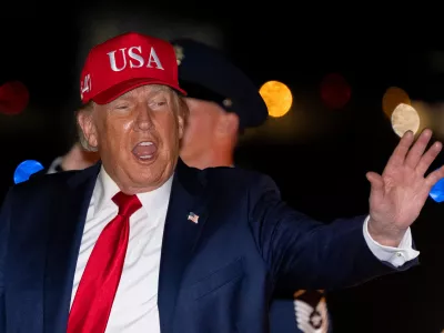 President Donald Trump waves as he arrives on Air Force One, Wednesday, Sept. 16, 2026, at Joint Base Andrews, Md. (AP Photo/Alex Brandon)