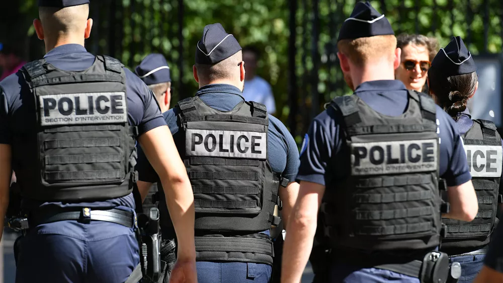 Paris, France-08 05 2024: Police patrol on a street in Paris, France.
