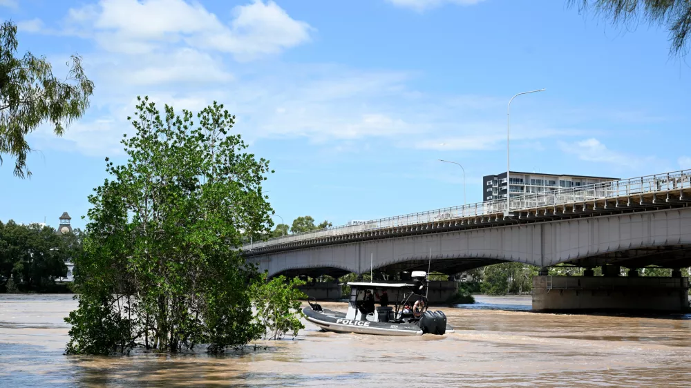 22 January 2026, Australia, Rockhampton: Water police conduct welfare checks as floodwaters from the Fitzroy River inundate areas in Rockhampton, Queensland. Photo: Sylvia Liber/AAP/dpa