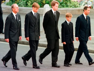 FILE - From left: Britain's Prince Philip, Prince William, Earl Spencer, Prince Harry and Prince Charles walk outside Westminster Abbey during the funeral procession for Diana, Princess of Wales, Sept. 6, 1997. (AP Photo/Jeff J. Mitchell, Pool, File)
