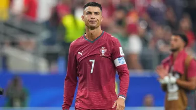 FILE - Portugal's Cristiano Ronaldo leaves the pitch after the World Cup round of 16 soccer match between Portugal and Spain in Arlington, Texas, near Dallas, Monday, July 6, 2026. (AP Photo/Julio Cortez, file)