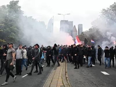 Protesters attend a far-right groups' protest against immigration and asylum policies, in The Hague, Netherlands, Saturday, Sept. 19, 2026. (AP Photo/Mouneb Taim)