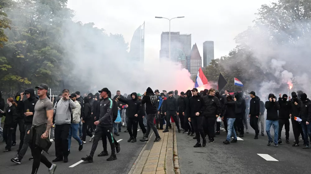 Protesters attend a far-right groups' protest against immigration and asylum policies, in The Hague, Netherlands, Saturday, Sept. 19, 2026. (AP Photo/Mouneb Taim)