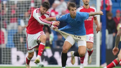 Arsenal's Kai Havertz pulls Brighton's Luka Vuskovic during the English Premier League soccer match between Brighton & Hove Albion and Arsenal in Brighton, England, Saturday, Sept. 19, 2026. (AP Photo/Kin Cheung)