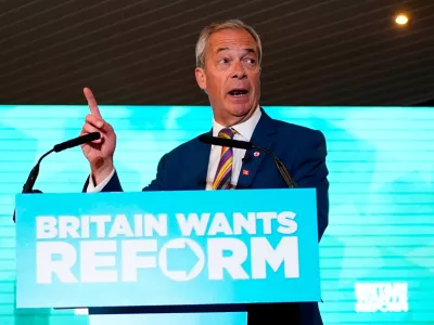 Reform UK leader Nigel Farage speaks to supporters at Chelmsford City Racecourse, Friday May 8, 2026, in Essex, England, following the 2026 local election results. (Jordan Pettitt/PA via AP)