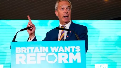 Reform UK leader Nigel Farage speaks to supporters at Chelmsford City Racecourse, Friday May 8, 2026, in Essex, England, following the 2026 local election results. (Jordan Pettitt/PA via AP)