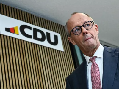 German Chancellor and Christian Democratic Union (CDU) party leader, Friedrich Merz, walks to attend a press conference, after the state elections, in Berlin, Germany, September 21, 2026. REUTERS/Annegret Hilse   TPX IMAGES OF THE DAY