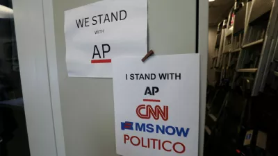 An updated solidarity sign adding CNN, MSNOW and POLITICO hangs outside the Associated Press booth at the White House grounds after US President Donald Trump banned three major news outlets – CNN, MS NOW and Politico from the White House, in Washington, D.C., US, September 21, 2026. REUTERS/Kevin Lamarque