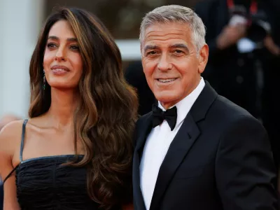 IPA88625919 - VENICE, ITALY - SEPTEMBER 2: Amal Clooney (L) and George Clooney attend the red carpet event for George Clooney's Golden Lion for Lifetime Achievement during the 83rd Venice International Film Festival at the Sala Grande on September 2, 2026, in Venice, Italy. &copy;Photo: Cinzia Camela.,Image: 1130210292, License: Rights-managed, Restrictions:, Model Release: no 