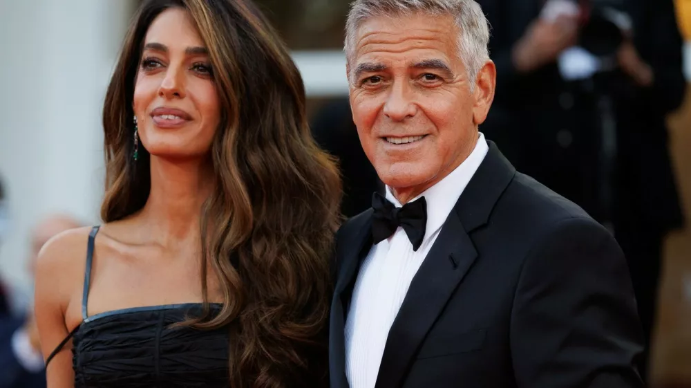 IPA88625919 - VENICE, ITALY - SEPTEMBER 2: Amal Clooney (L) and George Clooney attend the red carpet event for George Clooney's Golden Lion for Lifetime Achievement during the 83rd Venice International Film Festival at the Sala Grande on September 2, 2026, in Venice, Italy. &copy;Photo: Cinzia Camela.,Image: 1130210292, License: Rights-managed, Restrictions:, Model Release: no 