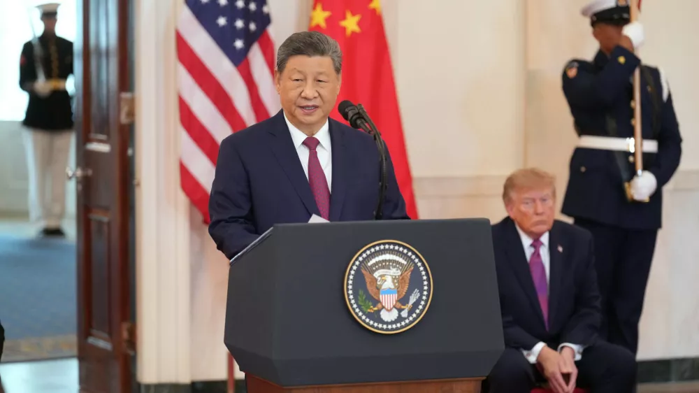 President Donald Trump listens as China's President Xi Jinping speaks during an arrival ceremony in the Grand Foyer of the White House, Thursday, Sept. 24, 2026, in Washington. (AP Photo/Jacquelyn Martin)