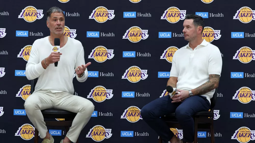 Sep 24, 2026; Los Angeles, CA, USA; Los Angeles Lakers president of basketball operations and general manager Rob Pelinka (left) and head coach JJ Redick speak to the media during a press conference at UCLA Health Training Center. Mandatory Credit: Kiyoshi Mio-Imagn Images