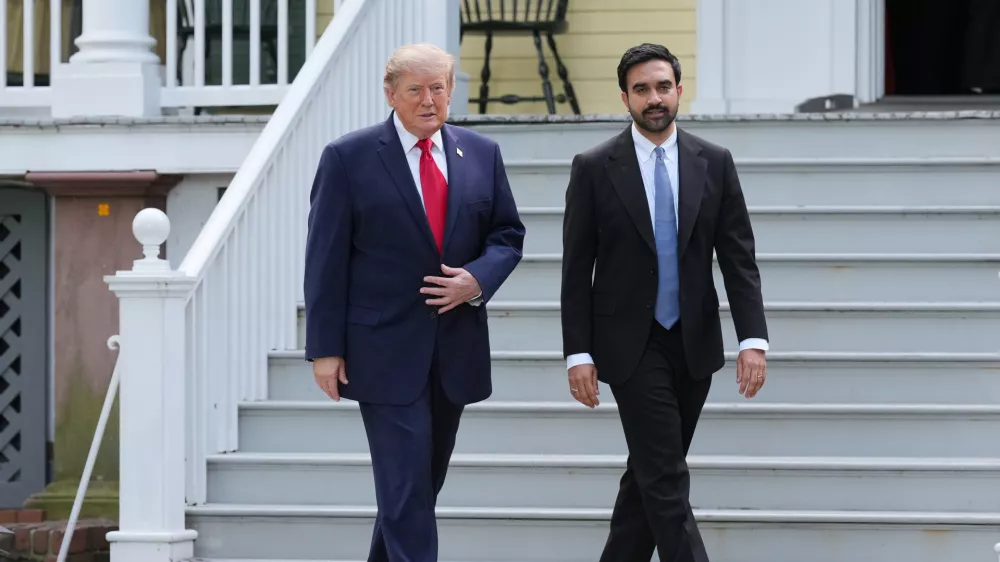 President Donald Trump, left, walks with New York City Mayor Zohran Mamdani after their meeting Monday, Sept. 21, 2026, in New York. (AP Photo/Adam Gray)