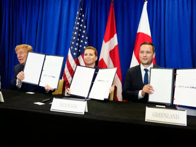 Denmark's Prime Minister Mette Frederiksen, center, Greenland's Prime Minister Jens-Frederik Nielsen, right, and US President Donald Trump at the signing ceremony of a security deal between the U.S., Denmark and Greenland at United Nations headquarters, Tuesday, Sept. 22, 2026. (Mads Claus Rasmussen/Ritzau Scanpix via AP)