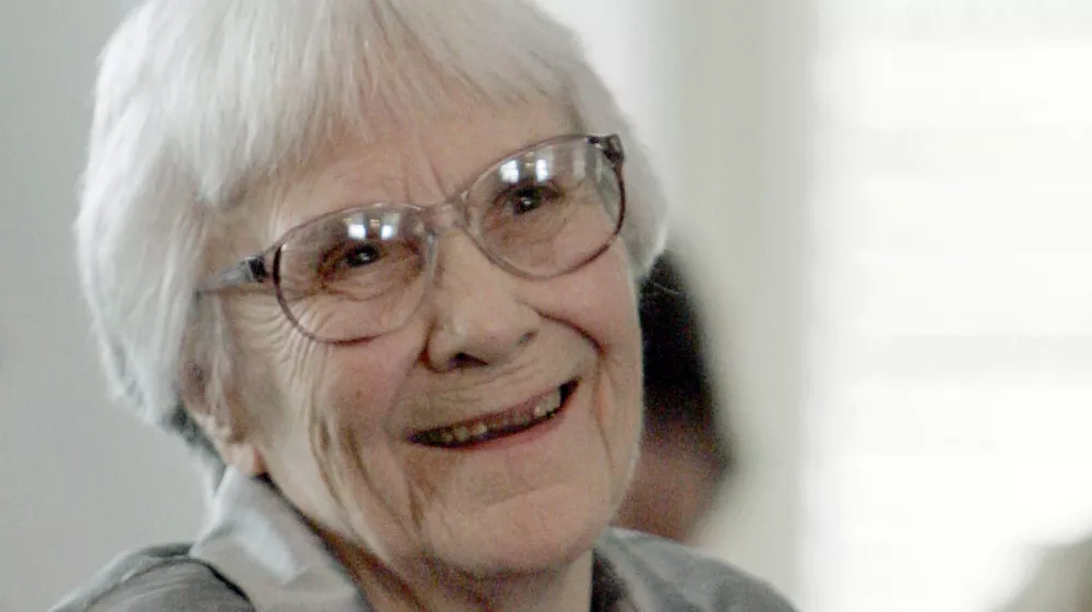 FILE - In this Aug. 20, 2007, file photo, author Harper Lee smiles during a ceremony honoring the four new members of the Alabama Academy of Honor at the Capitol in Montgomery, Ala. Harper Lee, the elusive author whose "To Kill a Mockingbird" became an enduring best seller and classic film with its child's-eye view of racial injustice in a small Southern town, has died according to Harper Collins spokeswoman Tina Andreadis. She was 89. (AP Photo/Rob Carr, File)
