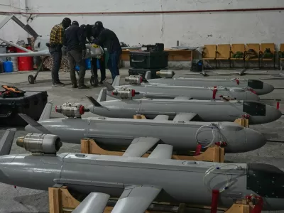 Servicemen of Ukraine's defense intelligence set up drones against Russian in an undisclosed location in Ukraine late Thursday, May 28, 2026. (AP Photo/Efrem Lukatsky)