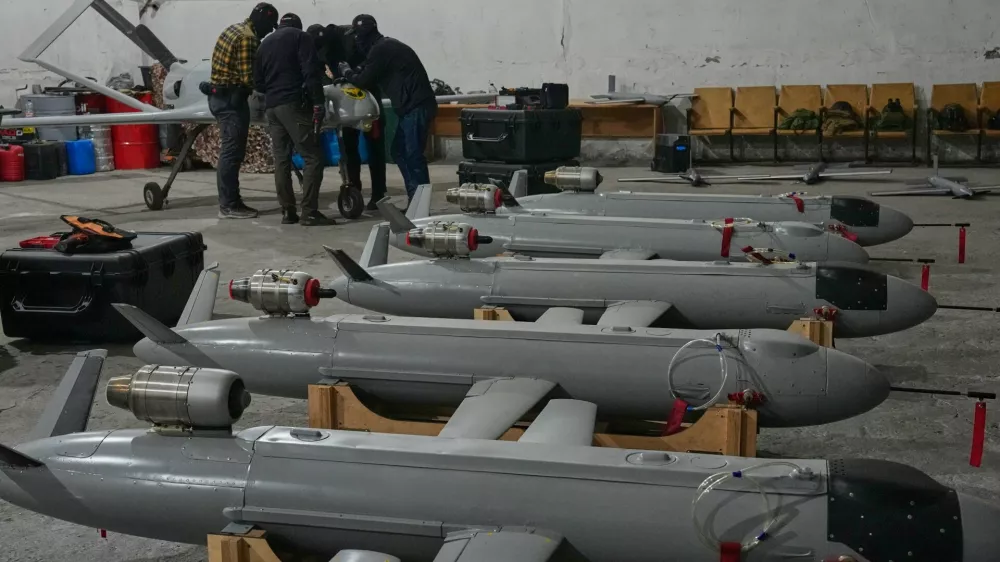 Servicemen of Ukraine's defense intelligence set up drones against Russian in an undisclosed location in Ukraine late Thursday, May 28, 2026. (AP Photo/Efrem Lukatsky)