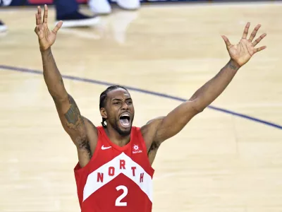 Toronto Raptors' Kawhi Leonard celebrates after the buzzer as the Raptors defeated the Golden State Warriors 114-110 during Game 6 of basketball&acirc;&euro;&trade;s NBA Finals, Thursday, June 13, 2019, in Oakland, Calif. The Raptors won the finals. (Frank Gunn/The Canadian Press via AP)