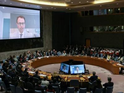 Dario Amodei co-founder of Anthropic via video link and OpenAI CEO Sam Altman address the United Nations Security Council during a session on Artificial Intelligence during the 81st United Nations General Assembly, at UN Headquarters in New York City, US, September 23, 2026. REUTERS/Brendan McDermid