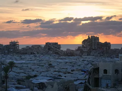 Tents sheltering displaced Palestinians are seen amid war-damaged buildings in Gaza City, Wednesday, Sept. 23, 2026. (AP Photo/Jehad Alshrafi)