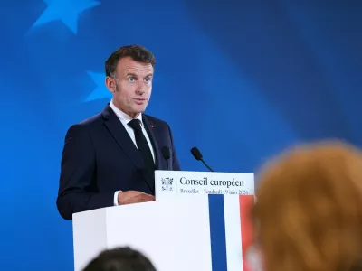 French President Emmanuel Macron speaks during a media conference at the EU summit in Brussels, Friday, June 19, 2026. (AP Photo/Marius Burgelman)