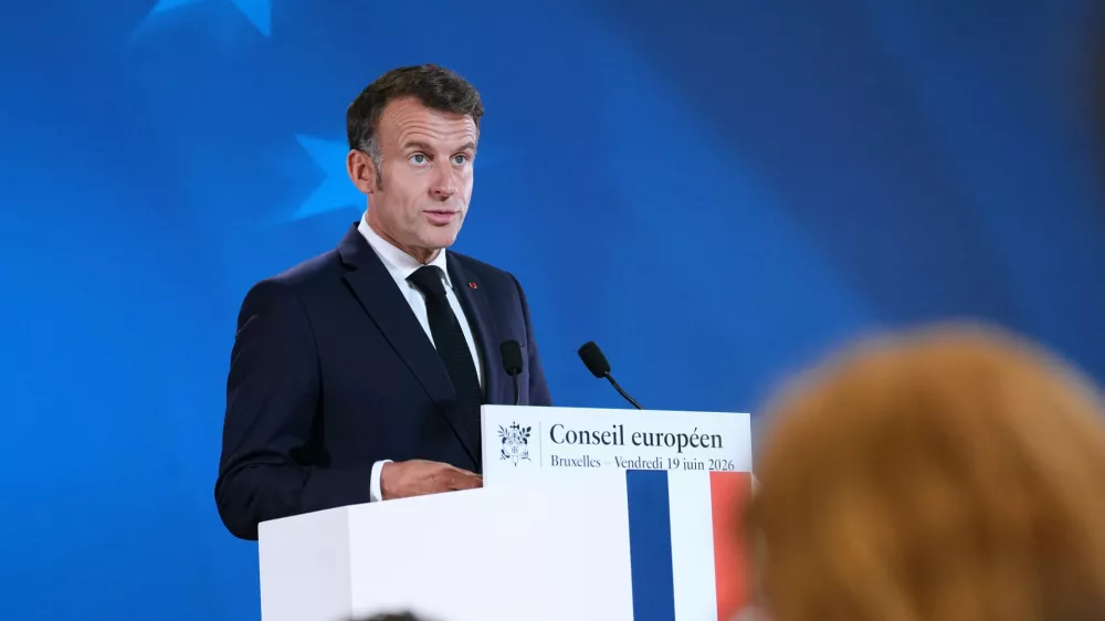 French President Emmanuel Macron speaks during a media conference at the EU summit in Brussels, Friday, June 19, 2026. (AP Photo/Marius Burgelman)