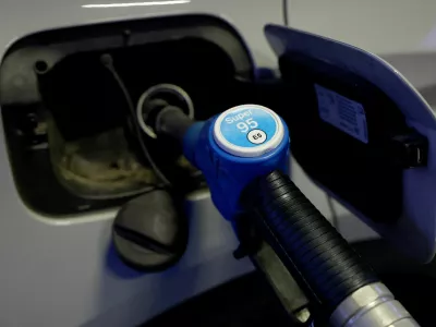 A fuel nozzle refuels a vehicle at a gas station in Berlin, Germany, September 23, 2026. Germany's government announced tax cuts on gasoline and diesel to provide relief for consumers and businesses affected by soaring fuel prices. REUTERS/Lisi Niesner