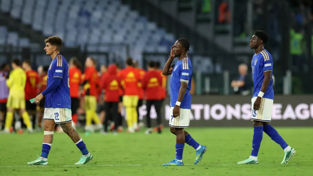 Soccer Football - Nations League - Group A - Italy v Belgium - Stadio Olimpico, Rome, Italy - September 25, 2026 Italy's Giovanni Di Lorenzo, Issa Doumbia and Mohamed Ali Zoma look dejected after the match REUTERS/Ciro De Luca
